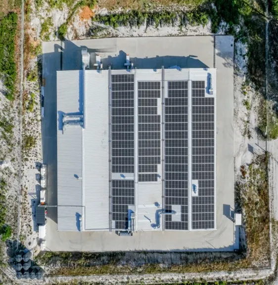 Aerial view of the Bioshroom facility with solar panels